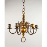 A SMALL DUTCH BRONZE SIX BRANCH CHANDELIER. 14ins high.