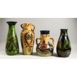 A GROUP OF FOUR ART POTTERY VASES, with incised decoration. Tallest: 15.5ins high.