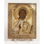 A RUSSIAN SILVER GILT ICON. Christ. Silver Marks C.R. 84 and head. 8.5ins x 7ins.