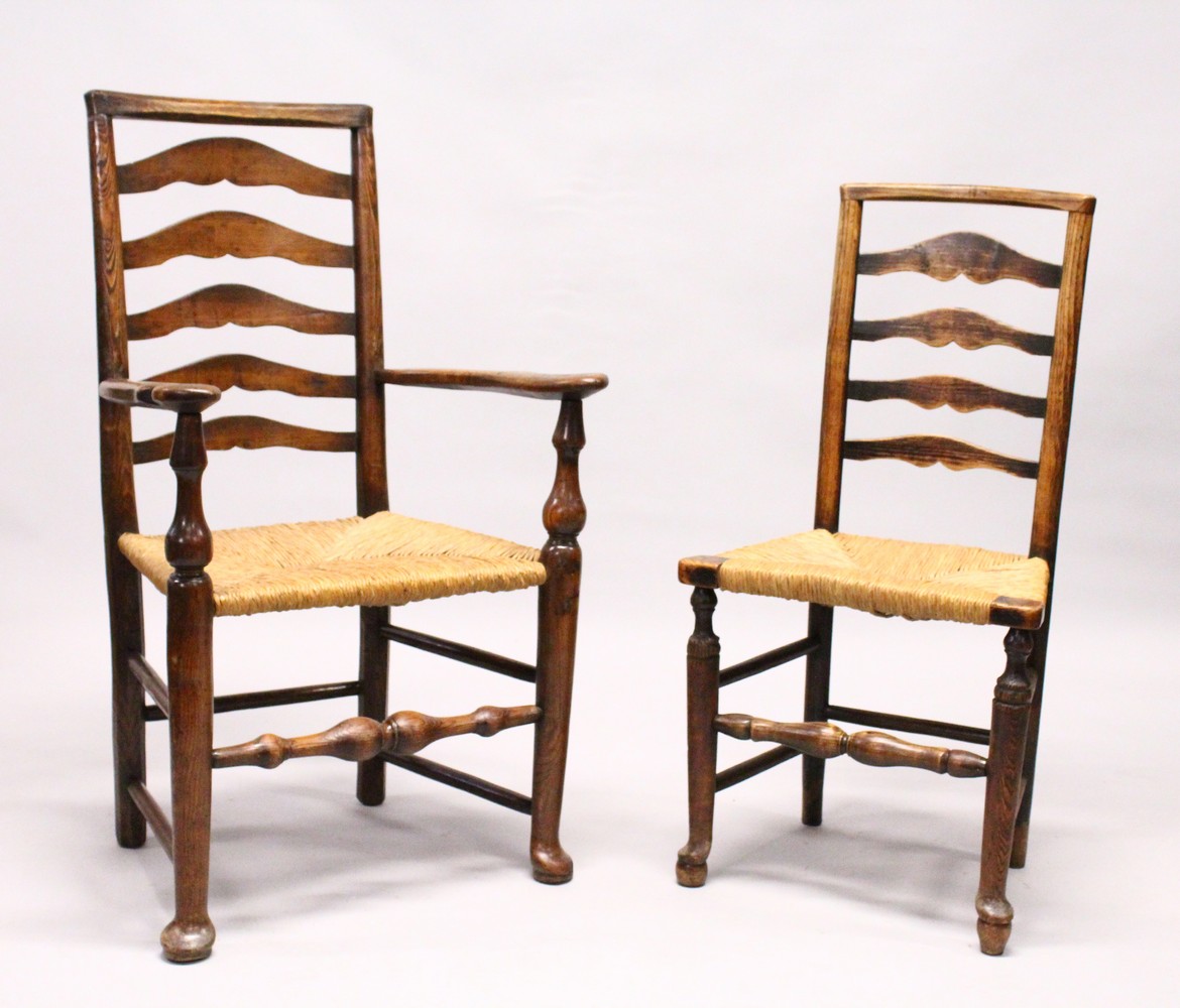 A MATCHED SET OF SIX 19TH CENTURY ASH AND ELM LADDER BACK DINING CHAIRS, two with arms, with rush