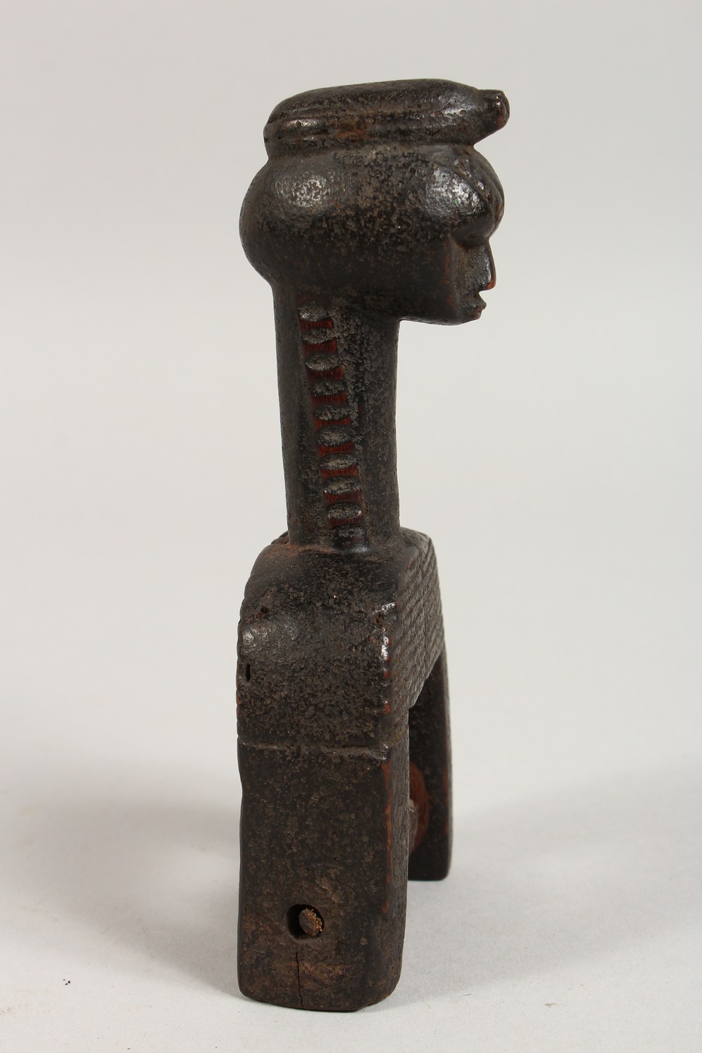 AN AFRICAN CARVED WOOD FIGURAL PULLEY. 6.5ins high. - Image 2 of 2