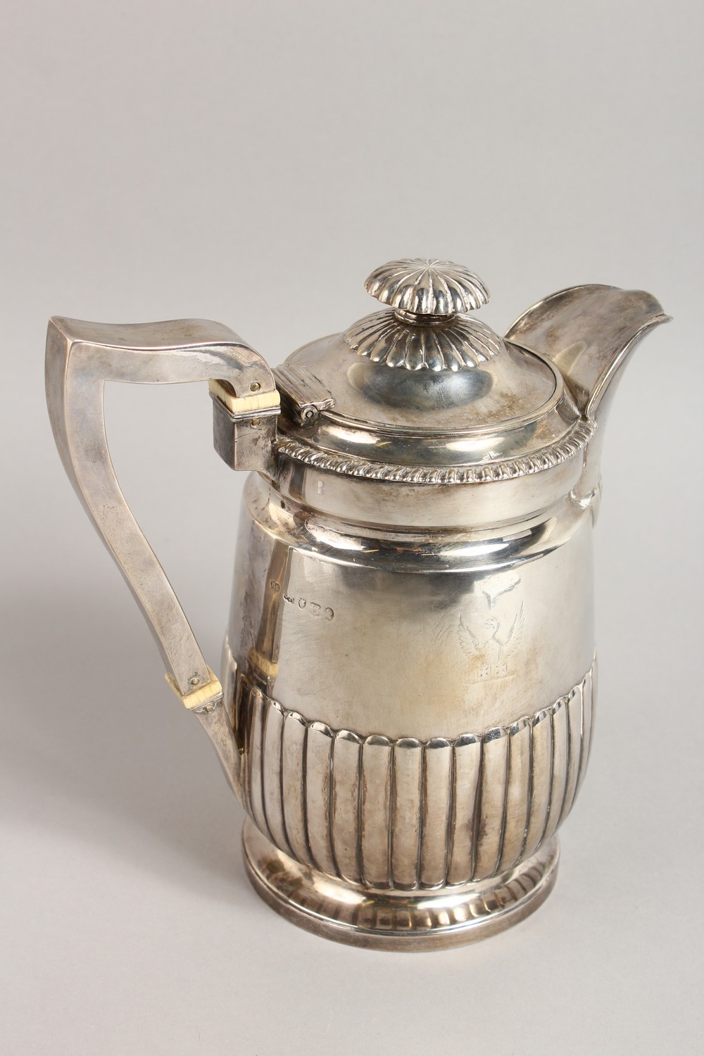 A GEORGE III SEMI FLUTED JUG, with gadrooned edge, crested. London 1815. Maker: R.E. Weight 22ozs. - Image 7 of 11