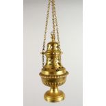 A PIERCED BRASS INCENSE BURNER. 8.5ins high.