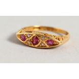 AN 18CT YELLOW GOLD, RUBY AND DIAMOND RING.