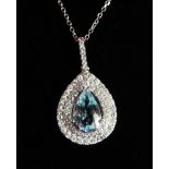 AN 18CT WHITE GOLD, AQUAMARINE AND DIAMOND PENDANT NECKLACE.