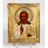A RUSSIAN SILVER GILT ICON. Christ. Silver Marks head 84 and other marks. 9ins x 7ins.