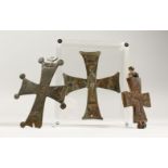 THREE BYZANTINE BRONZE CROSSES, two flat-backed with incised decoration, one reliquary cross, 12th