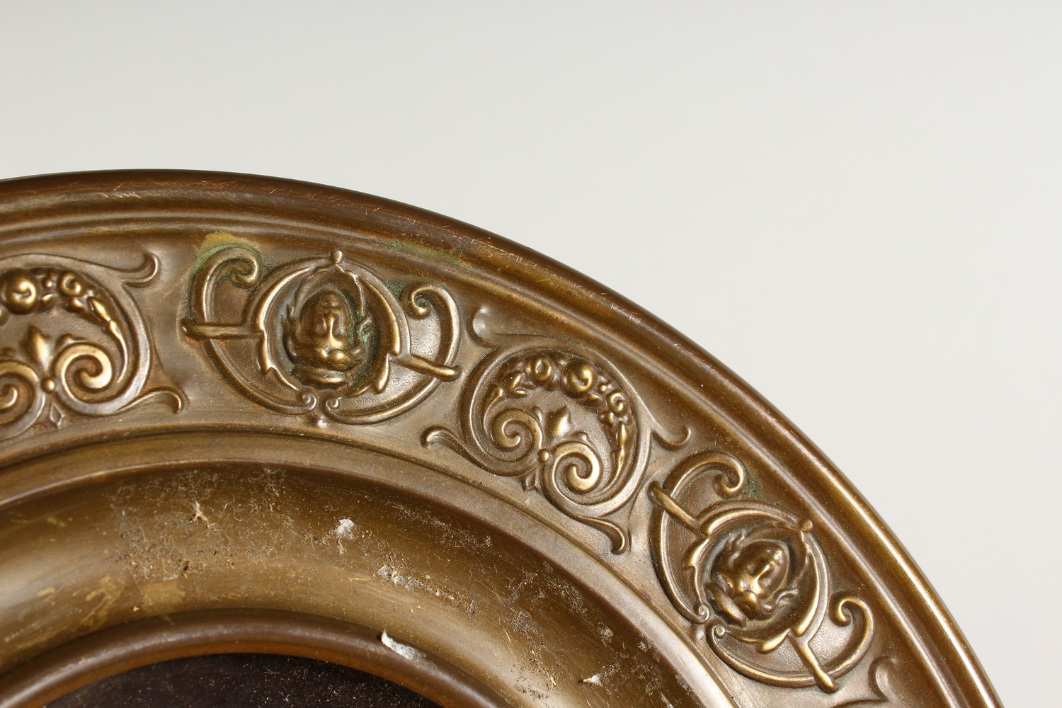 A PAIR OF EMBOSSED CIRCULAR BRASS PLAQUES, inset with porcelain panel decorated with portrait busts. - Image 2 of 6