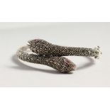 A SILVER MARCASITE SNAKE BRACELET.