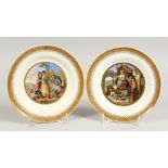 A PAIR OF PLATES, Resting Soldier and Tavern. 7ins diameter.