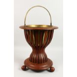 A DUTCH MAHOGANY JARDINIERE, with brass liner. 16ins high.