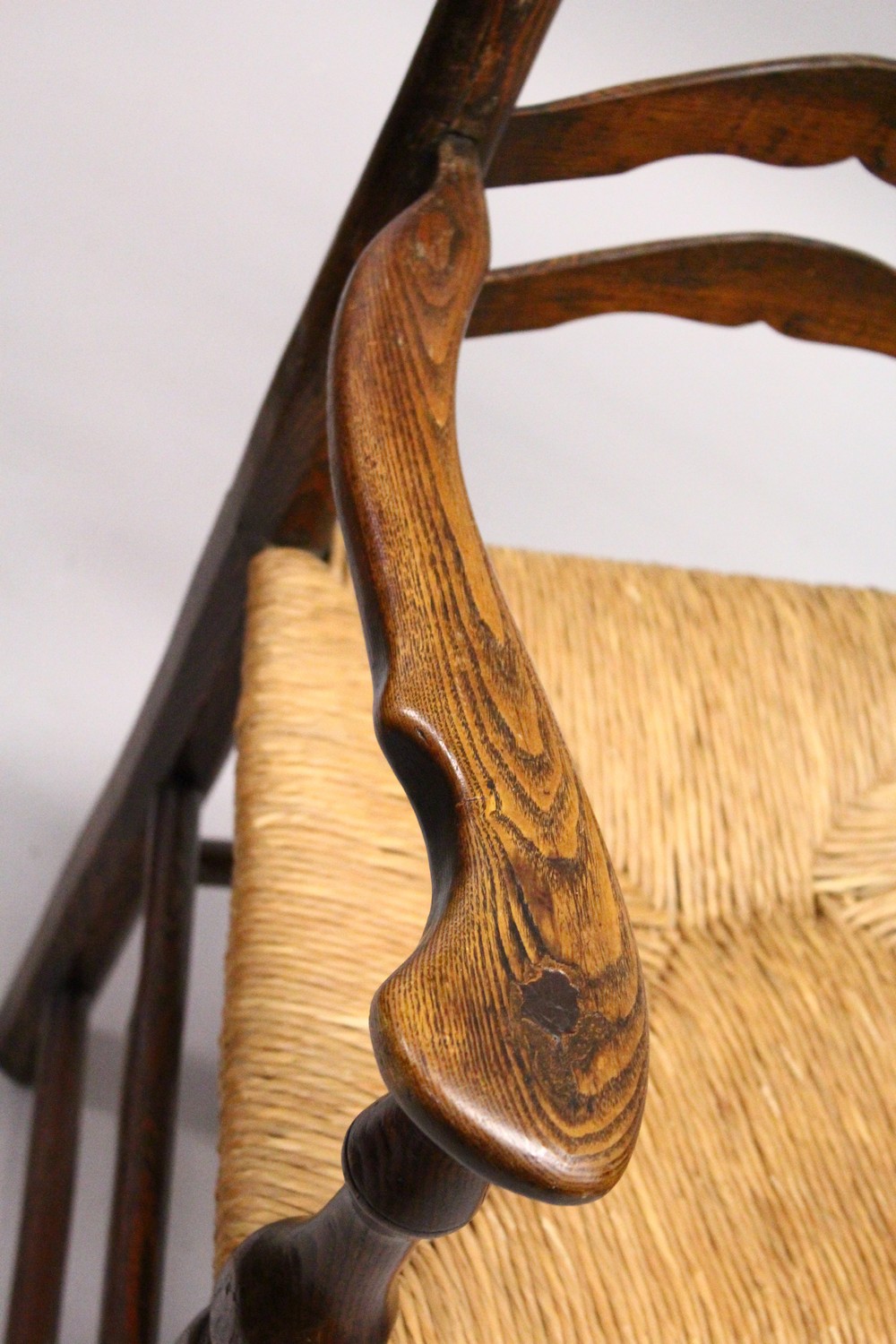 A MATCHED SET OF SIX 19TH CENTURY ASH AND ELM LADDER BACK DINING CHAIRS, two with arms, with rush - Image 4 of 8