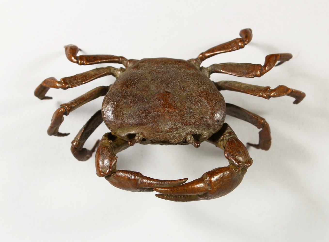 A JAPANESE BRONZE MODEL OF A CRAB. 4ins wide.