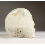 A LARGE ROCK CRYSTAL MODEL OF A SKULL. 8ins long.
