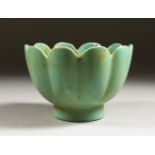 A PALE GREEN GROUND LOTUS SHAPE BOWL. 6ins diameter.