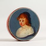 AN EARLY 19TH CENTURY CIRCULAR PAPIER MACHE PATCH BOX, painted with a portrait bust. 3.25ins