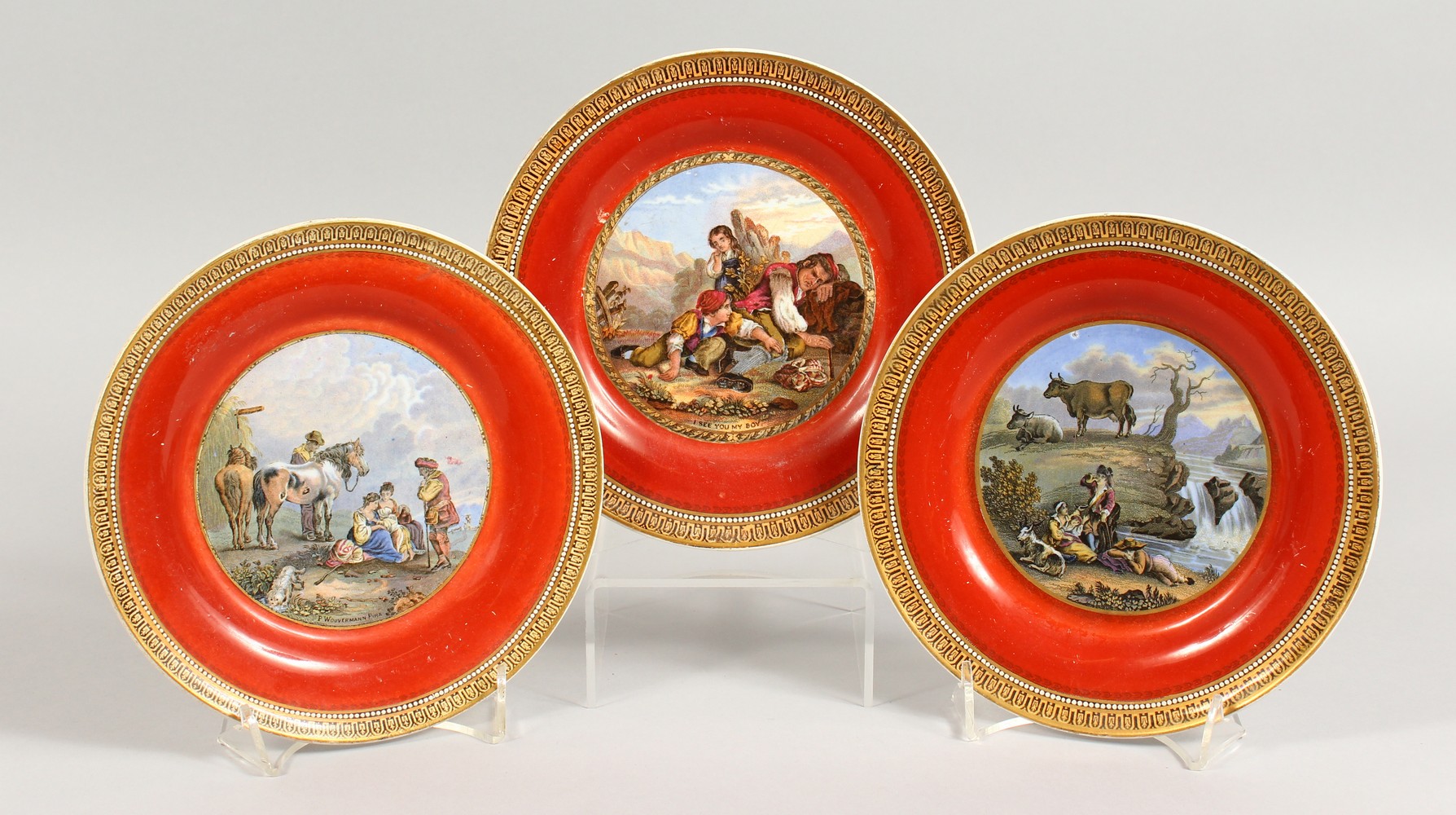 A SET OF THREE PLATES, "I Sell You My Boy" and two scenes after Wouwerman. 7ins diameter.