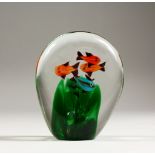 A MURANO STYLE PAPERWEIGHT, with fish decoration. 4.25ins high.