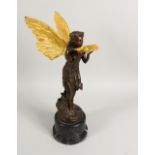 A BRONZE FIGURE OF A FAIRY, 20TH CENTURY, standing holding a shell in her hands, on a marble base.