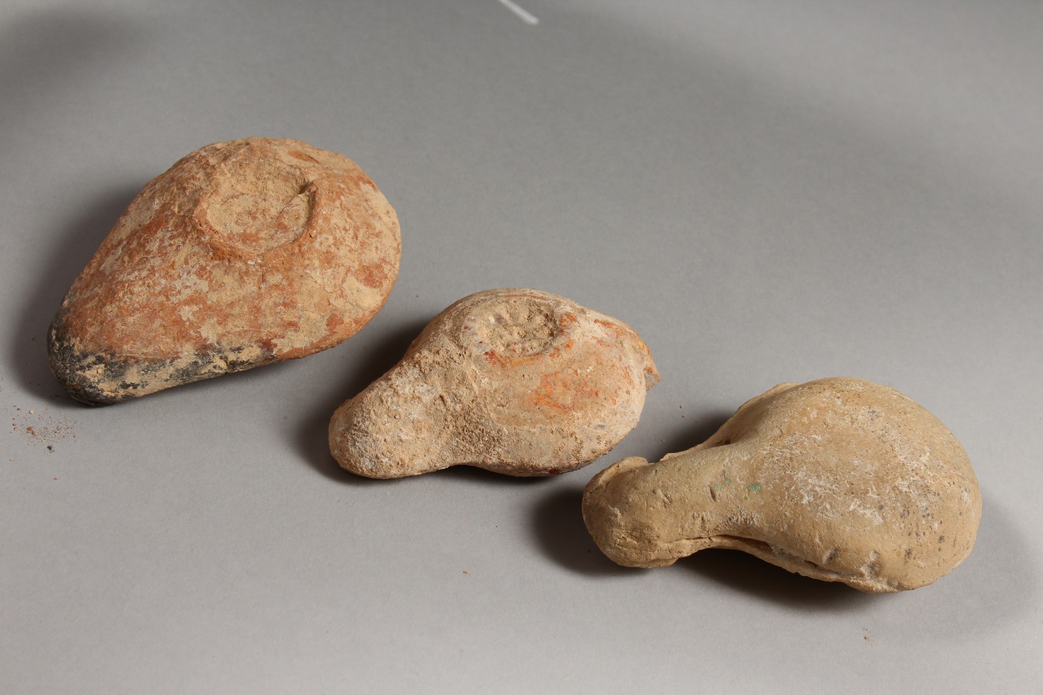 THREE ROMAN TERRACOTTA OIL LAMPS. - Image 6 of 6