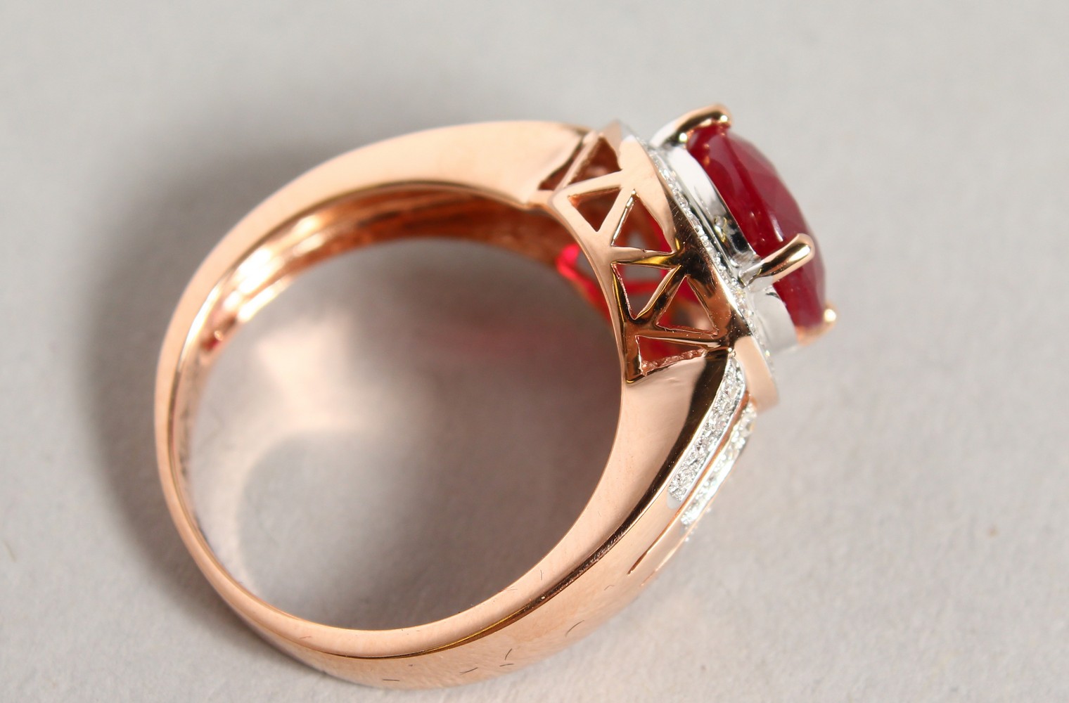 A 14K ROSE GOLD AND DIAMOND RING, set with an oval cut ruby approx. 4ct, diamonds approx. 0.48ct - Image 4 of 6