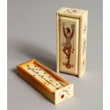 A DECORATIVE BONE BOX CONTAINING DOMINOES. 4.25ins long.