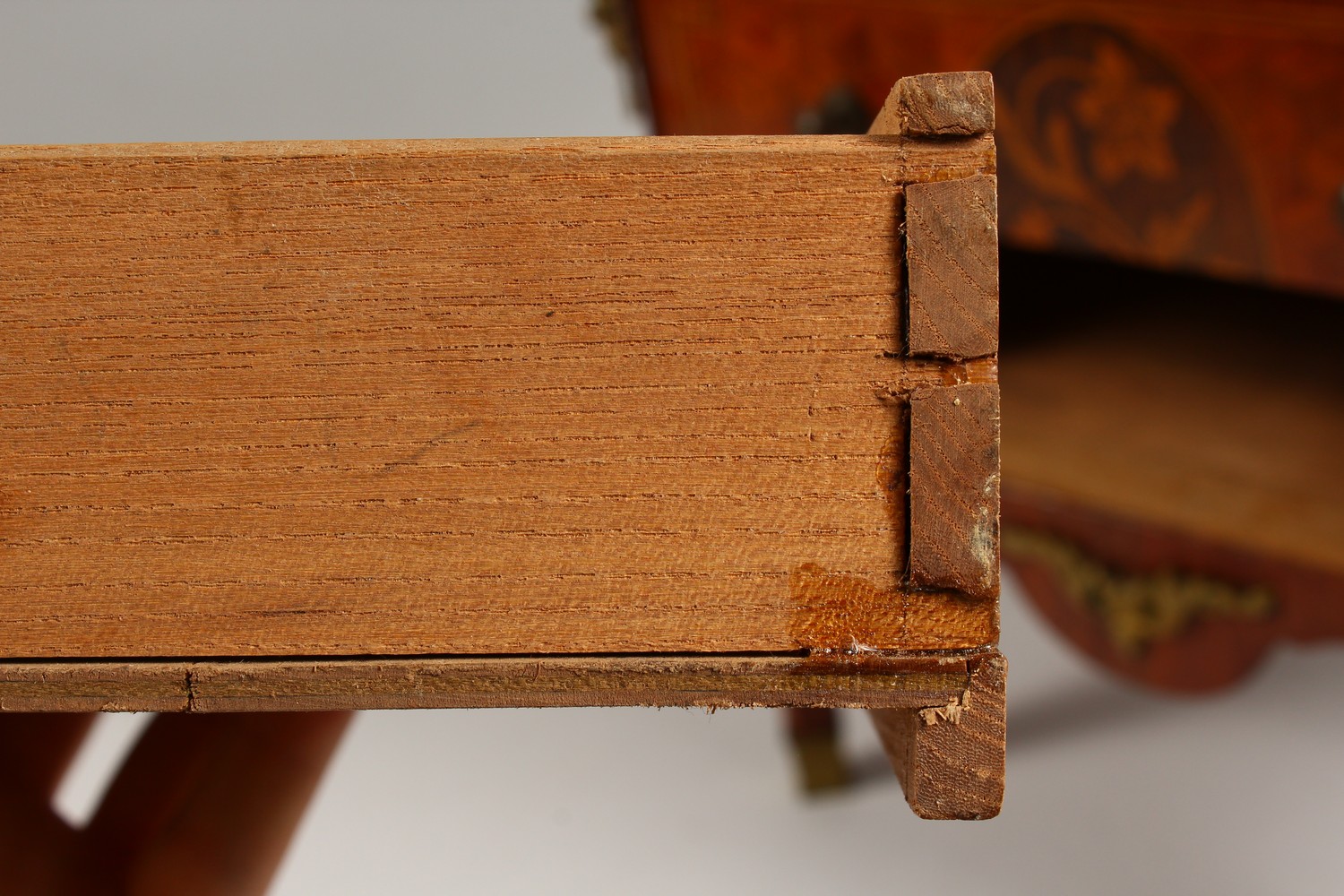 A MINIATURE FRENCH PARQUETRY AND MARQUETRY TWO DRAWER COMMODE, on tapering legs. 12ins wide. - Image 15 of 15