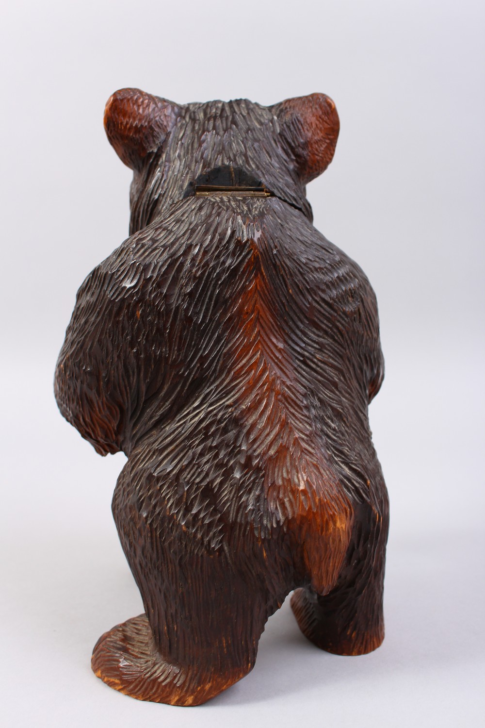 A GOOD 19TH CENTURY BLACK FOREST CARVED WOOD STANDING BEAR CADDY, with hinged head. 11ins high. - Image 4 of 12