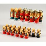 AN UNUSUAL RUSSIAN PAINTED AND LACQUERED WOOD FIGURAL CHESS SET, depicting various Soviet leaders.