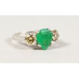 AN 19CT WHITE GOLD THREE STONE PEAR SHAPED EMERALD AND DIAMOND RING.