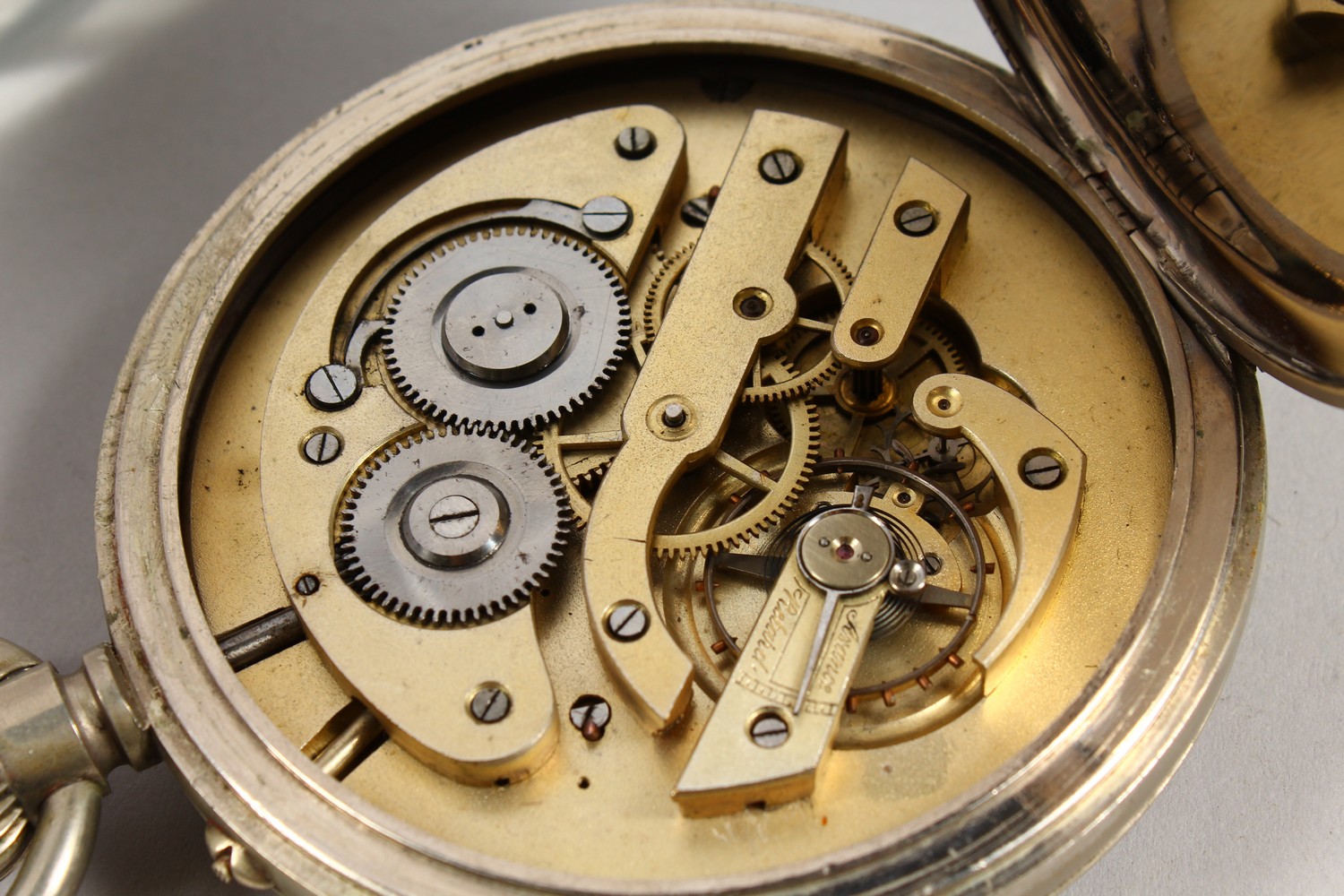 A GOLIATH POCKET WATCH, with a plated case and subsidiary seconds dial. 3.5ins diameter. - Image 4 of 4