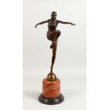 AN ART DECO STYLE BRONZE OF DANCERS, on a circular marble base. 22ins high.