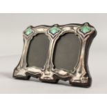 A SILVER AND ENAMEL ART DECO STYLE PHOTOGRAPH FRAME.