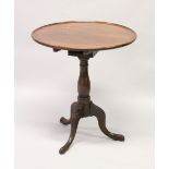 A GEORGE III MAHOGANY CIRCULAR TILT TOP TRIPOD TABLE, with bird cage action, carved legs with pad