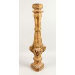 A 19TH CENTURY CARVED GILTWOOD ALTER CANDLESTICK BASE, of triangular outline. 32.5ins high.