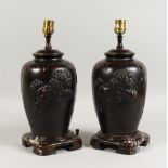 A PAIR OF CHINESE URN SHAPED TABLE LAMPS. 15ins high.