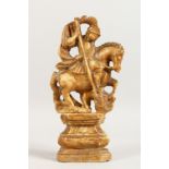 AN EARLY CARVED ALABASTER FIGURE OF ST GEORGE SLAYING THE DRAGON, on a socle base. 11.75ins.