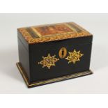 A VICTORIAN BLACK PAPIER MACHE TWO DIVISION TEA CADDY, the top with a scene after the hunt. 6.5ins