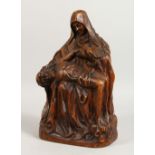 A CARVED OAK RELIGIOUS GROUP, Mary Magdalene Supporting The Dying Jesus. 12ins high.