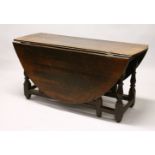 AN 18TH CENTURY OAK OVAL GATE-LEG DINING TABLE, with stretchered turned legs. 4ft 7ins long x 5ft
