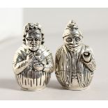 A PAIR OF .800 SILVER NOVELTY PUNCH AND JUDY SALT AND PEPPERS. 2.25ins.