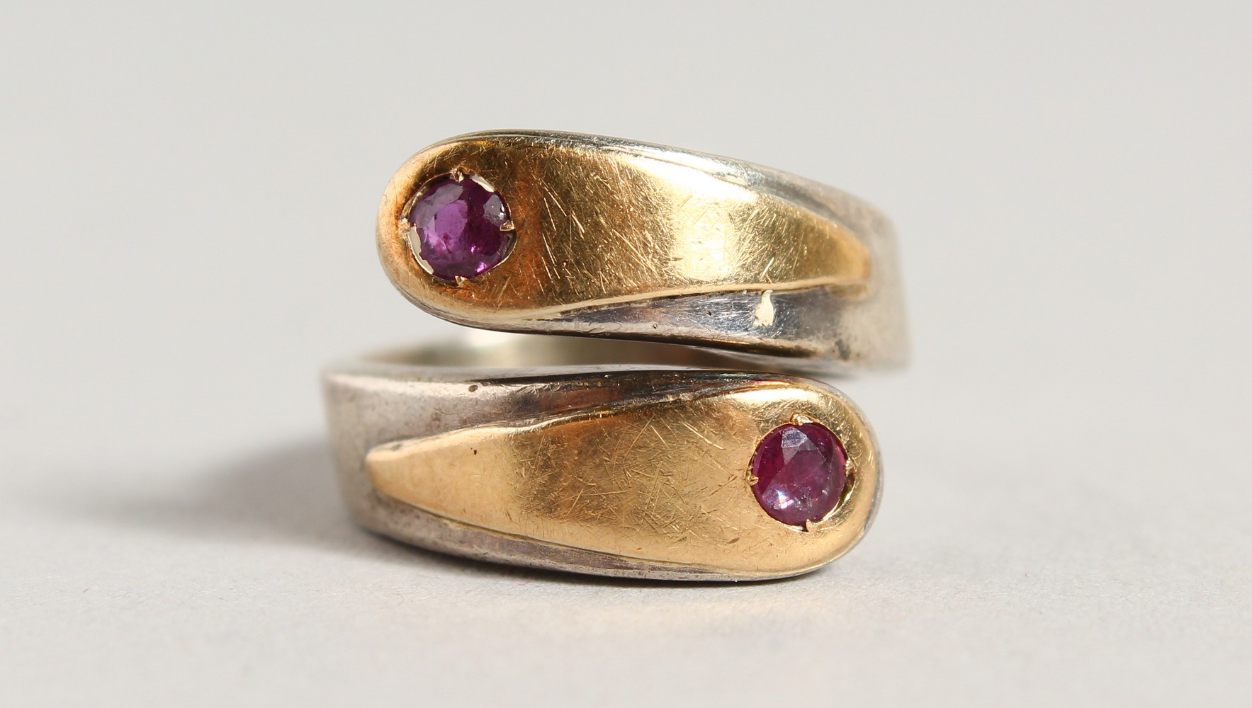 A STYLISH SILVER AND GOLD RING, set with two rubies. - Image 7 of 7