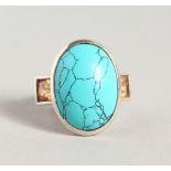 A STYLISH SILVER, TOPAZ AND TURQUOISE RING.