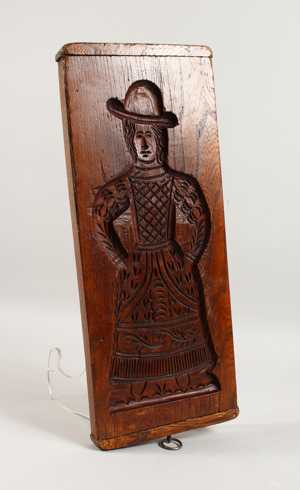 A 19TH CENTURY DOUBLE SIDED ELM GINGERBREAD MOULD, carved with a man and a woman. 18.5ins x 7.5ins. - Image 2 of 2