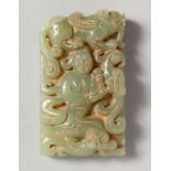 A CARVED JADE PENDANT. 2.5ins high.