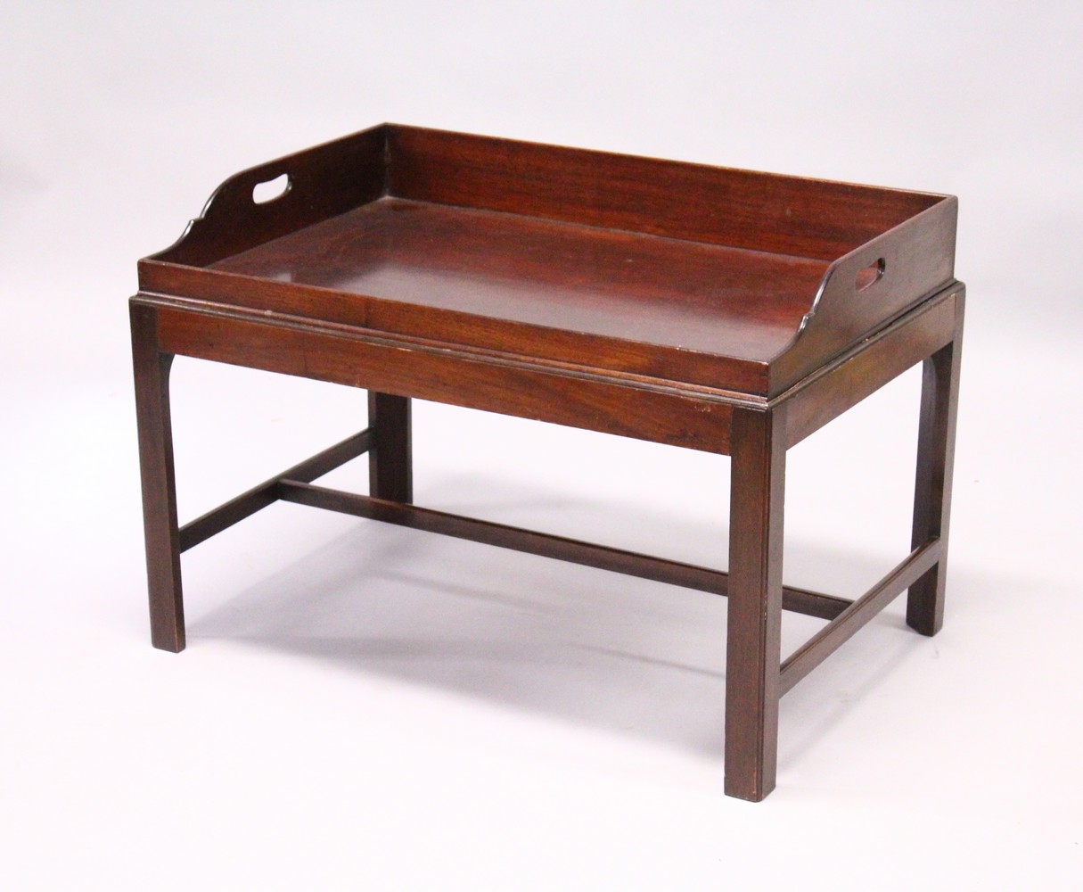 A GEORGE III MAHOGANY BUTLERS TRAY, on later stand. 2ft 9.5ins wide x 1ft 10.5ins deep x 1ft 10.5ins