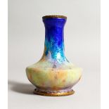 AN ART NOUVEAU ENAMEL VASE. 4ins high.