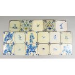 A GROUP OF SEVENTEEN 19TH CENTURY DELFT BLUE AND WHITE TILES, decorated with figures, animals and