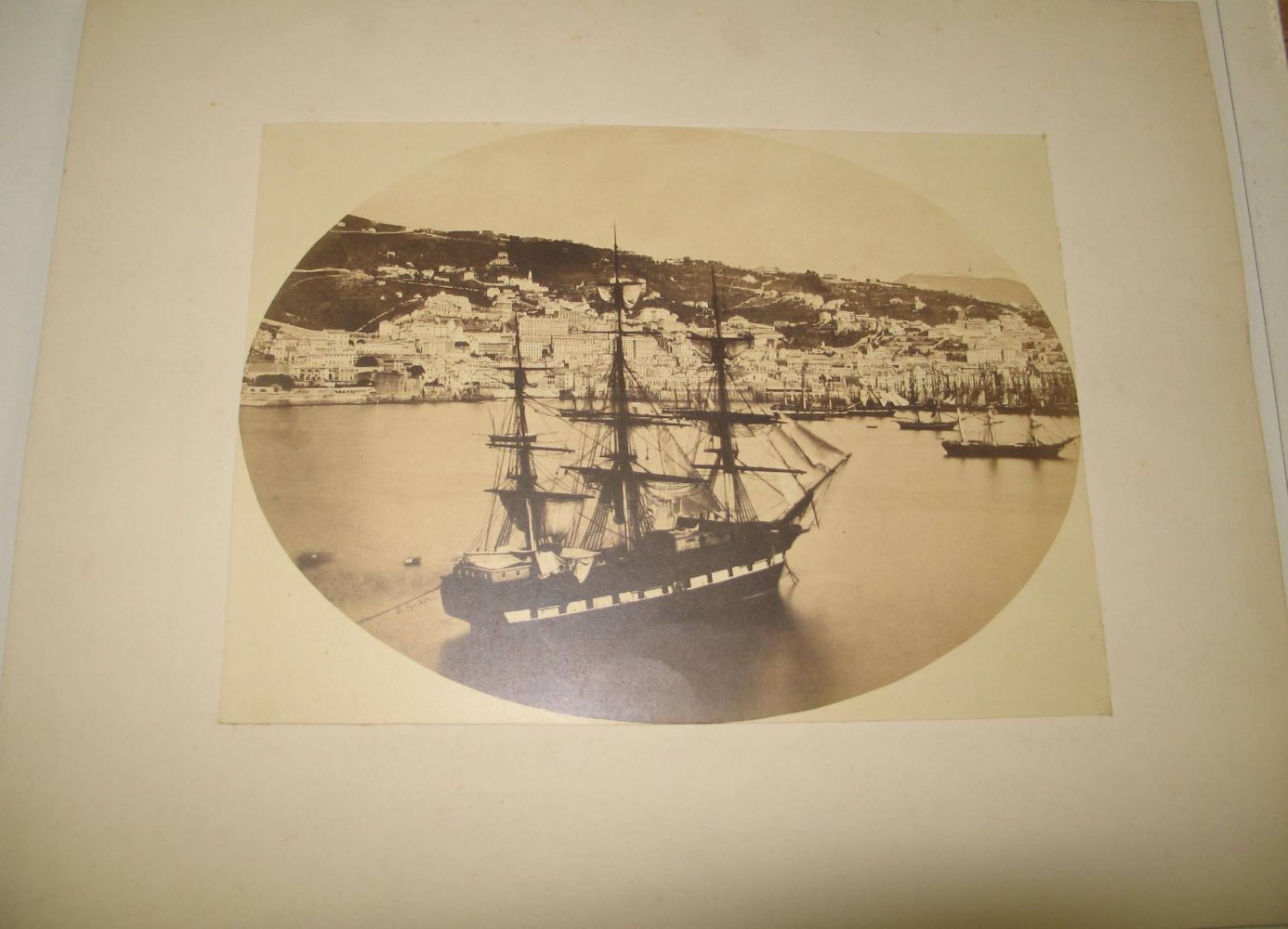 [PHOTOGRAPHS] GODARD (A.) three fine photographs of Genoa, oval, 8.5 x 12 inches, laid on card, 1