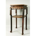 A GOOD CHINESE REDWOOD SQUARE TOP TWO TIER STAND with marble top, carved frieze and plain under